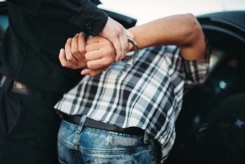 man in handcuff